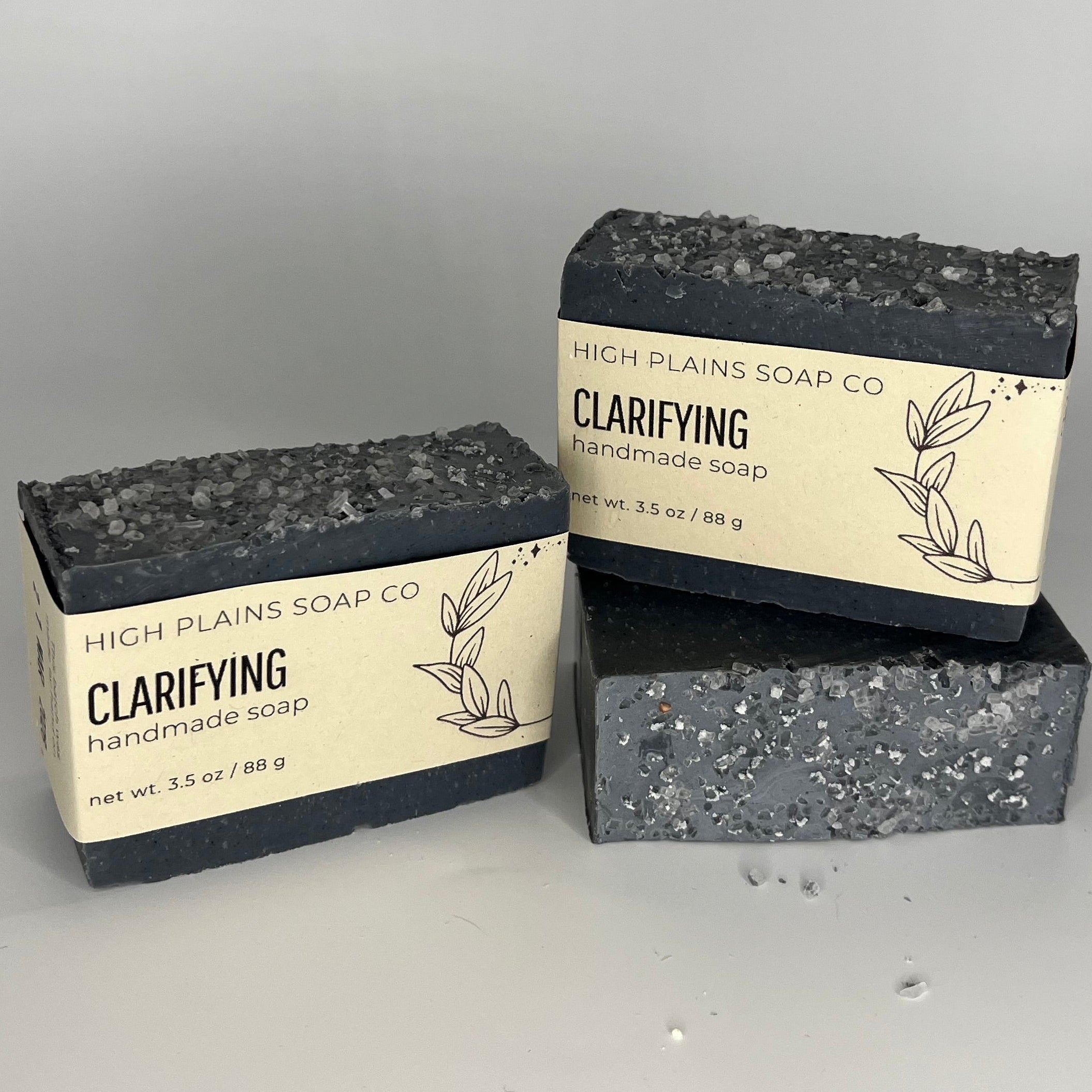 Three black bars of soap
