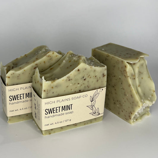 Three bars of speckled green and brown soap